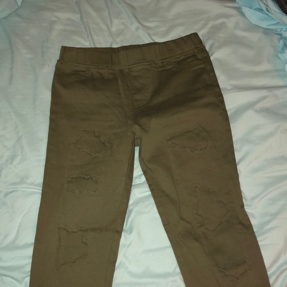 Stretchy green skinny jeans